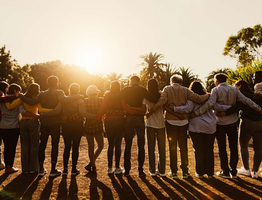 A community of people gathered in a field